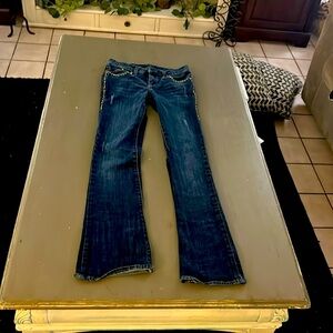 Rock and Republic Jeans. Size 0. Gold bling on side and back.
